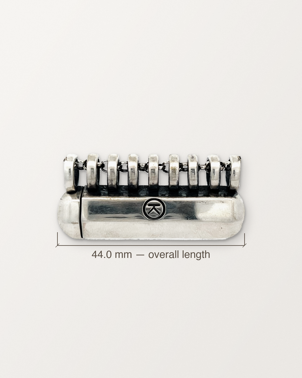 Sterling silver Kerala Large amulet with its measurement: 44.0 mm long from end to end.