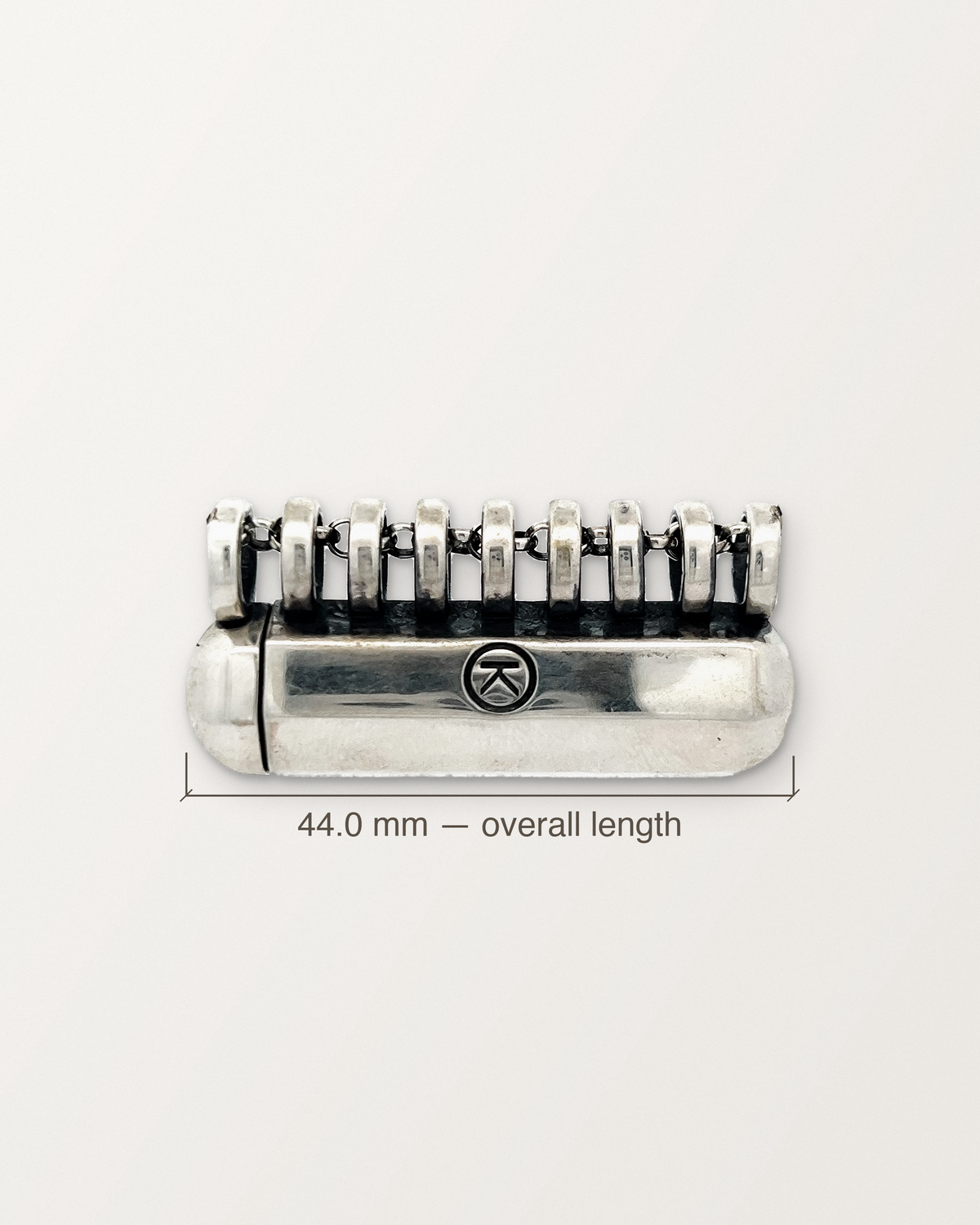 Sterling silver Kerala Large amulet with its measurement: 44.0 mm long from end to end.