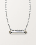 Sterling silver Kerala Pave amulet necklace, closed, on a warm bone-white background, chain exiting the top of frame.
