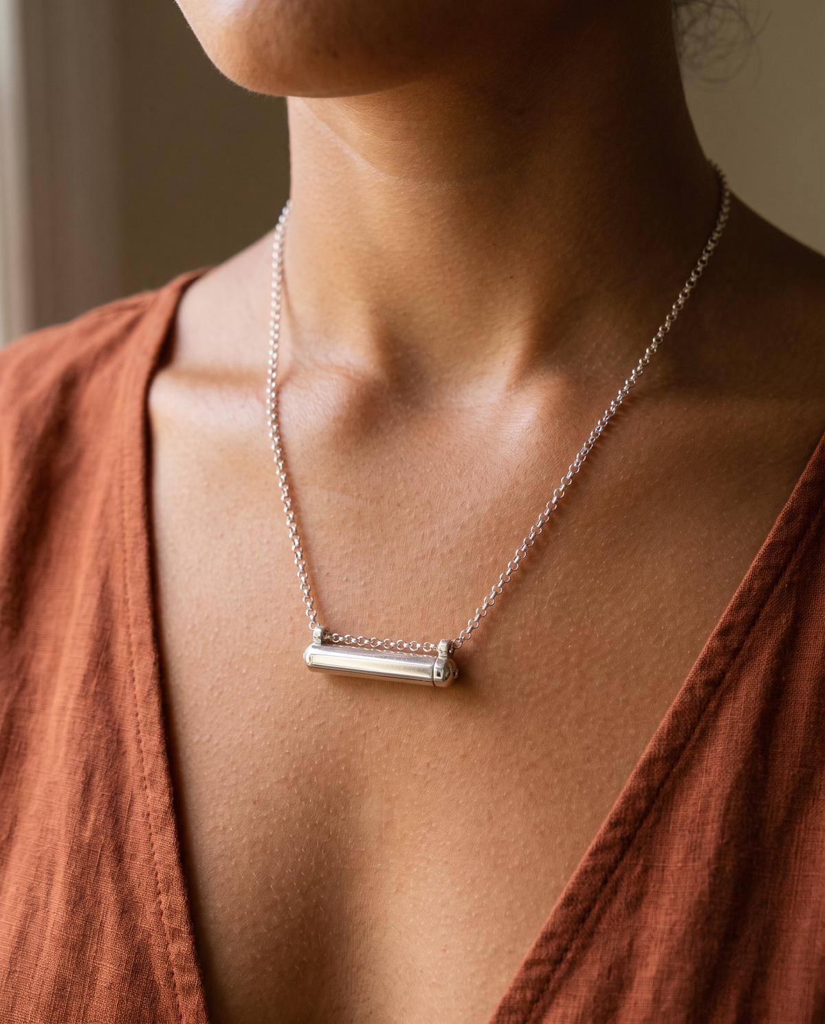 Sterling silver Kerala Small amulet necklace, worn.