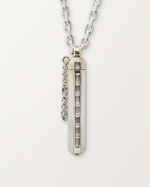 Kerala Vertical amulet necklace in sterling silver with white cubic zirconia baguettes, shown closed.