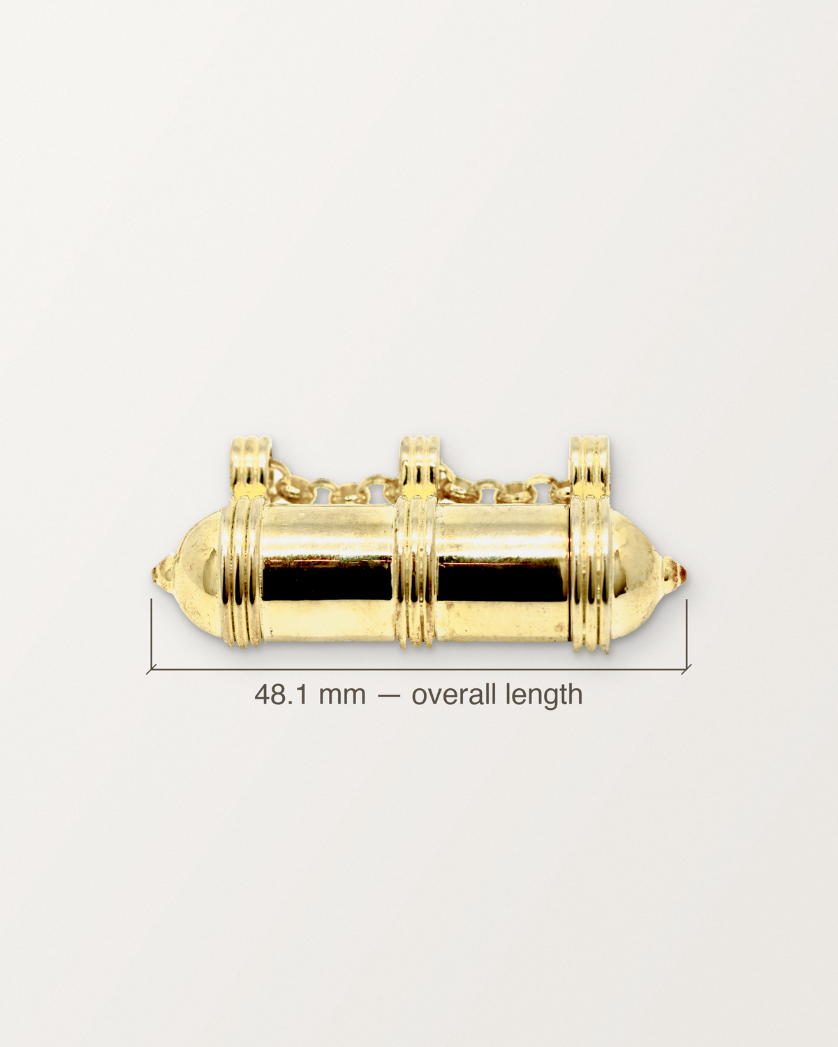 Pankaj openable amulet in 14K or 18K yellow gold, with its measurement: 48.1 mm long from end to end.