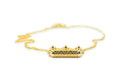 Shakti openable amulet necklace in solid gold, shown closed on a neutral background.