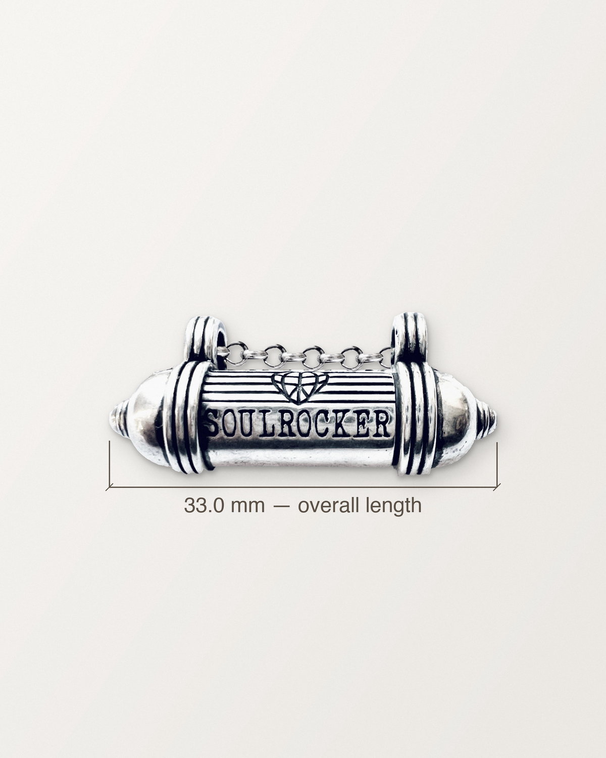 Sterling silver SOULROCKER amulet with its length measured: 33.0 mm.