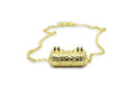Vana openable amulet necklace in solid gold, shown closed.