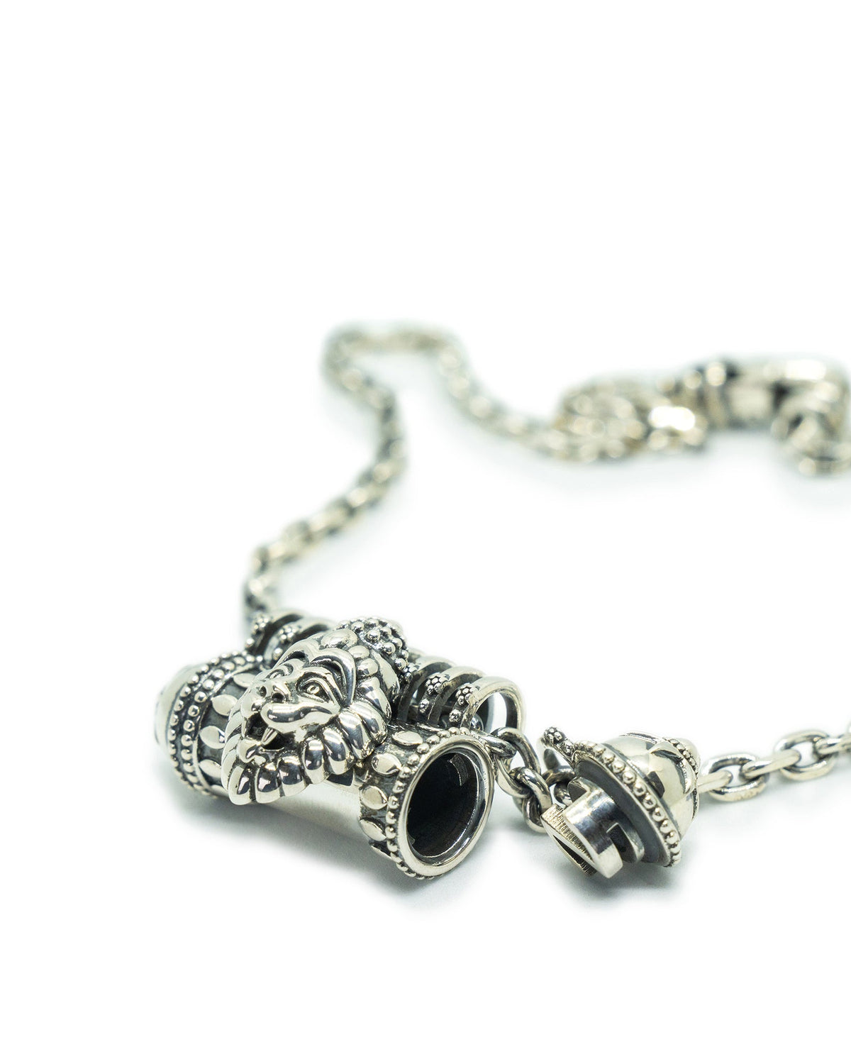 Narashimha amulet necklace in sterling silver, shown open with the chamber visible.