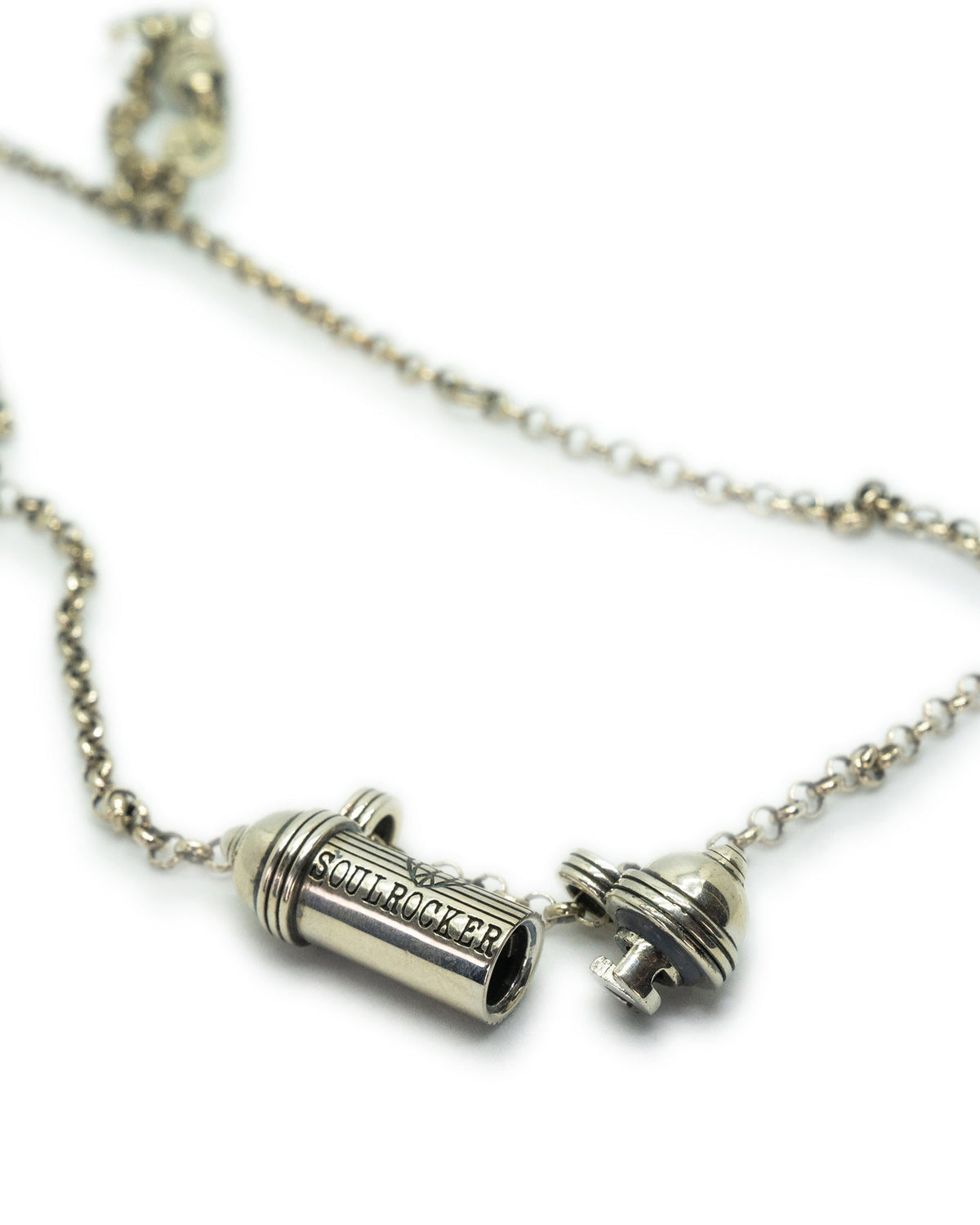 SOULROCKER × Michael Franti amulet necklace in sterling silver, shown open with the chamber visible.