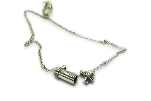SOULROCKER × Michael Franti amulet necklace in sterling silver, shown open with the chamber visible.