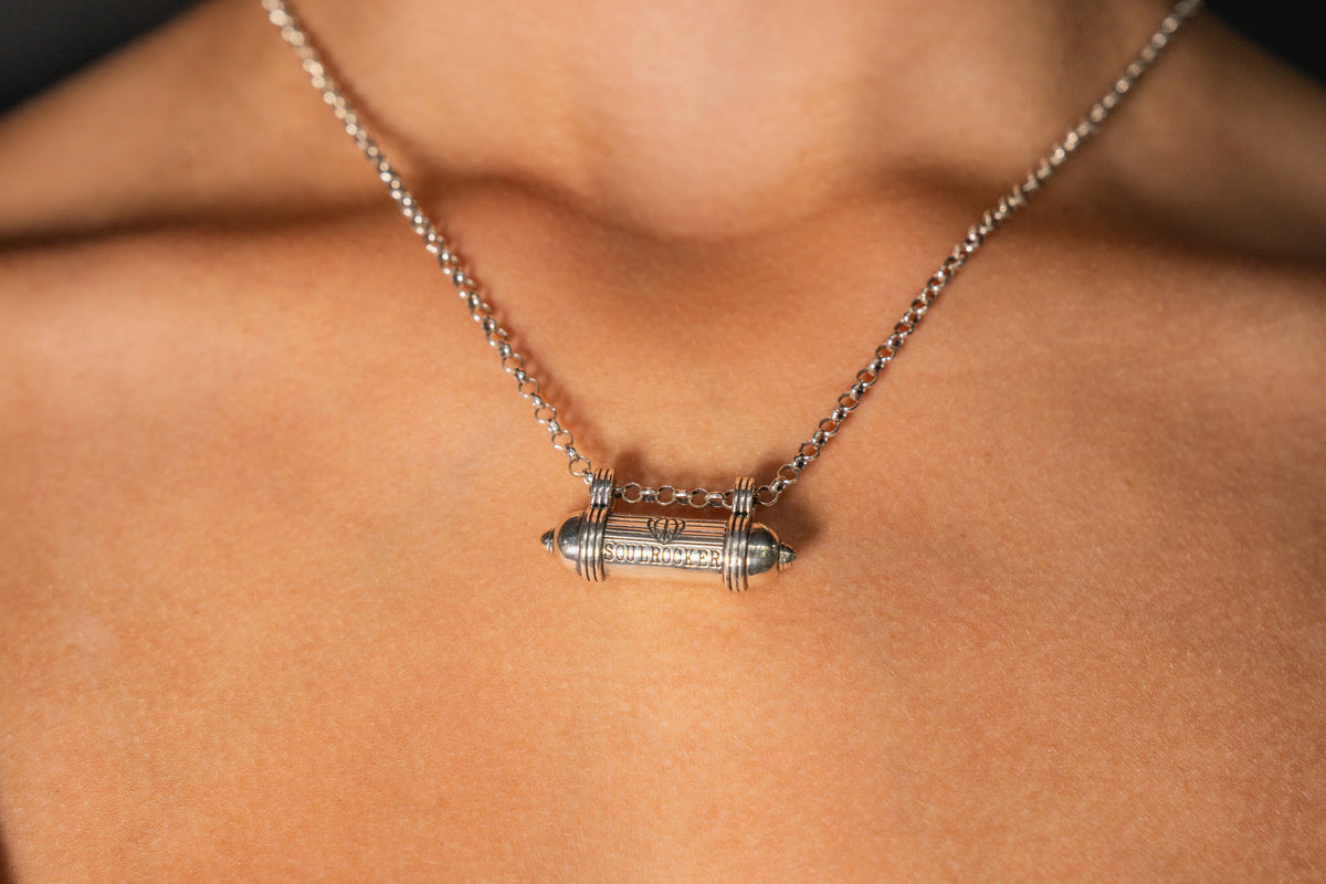 SOULROCKER amulet necklace in sterling silver, worn by a model.