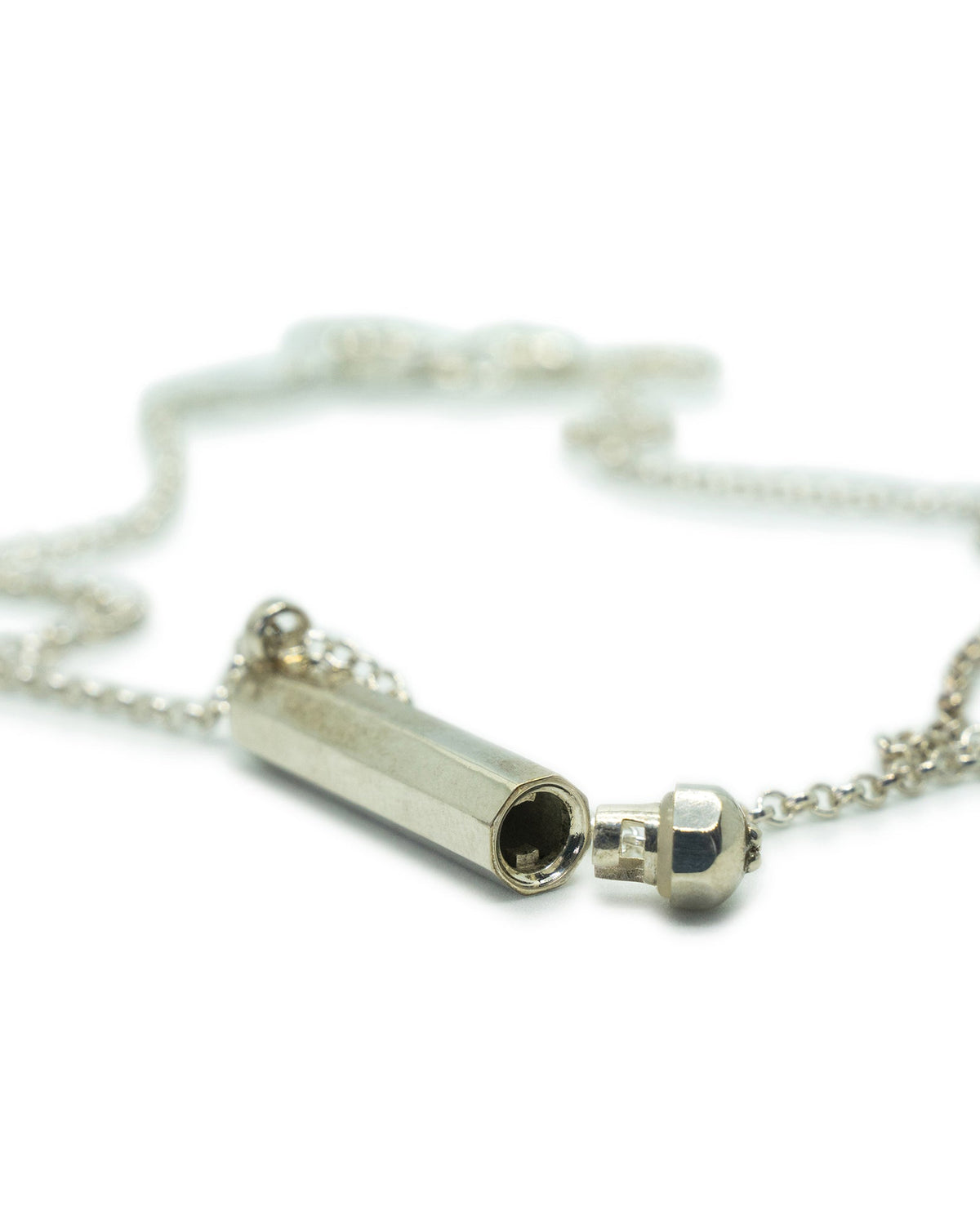 Kerala Small amulet necklace in sterling silver, shown open with the chamber visible.