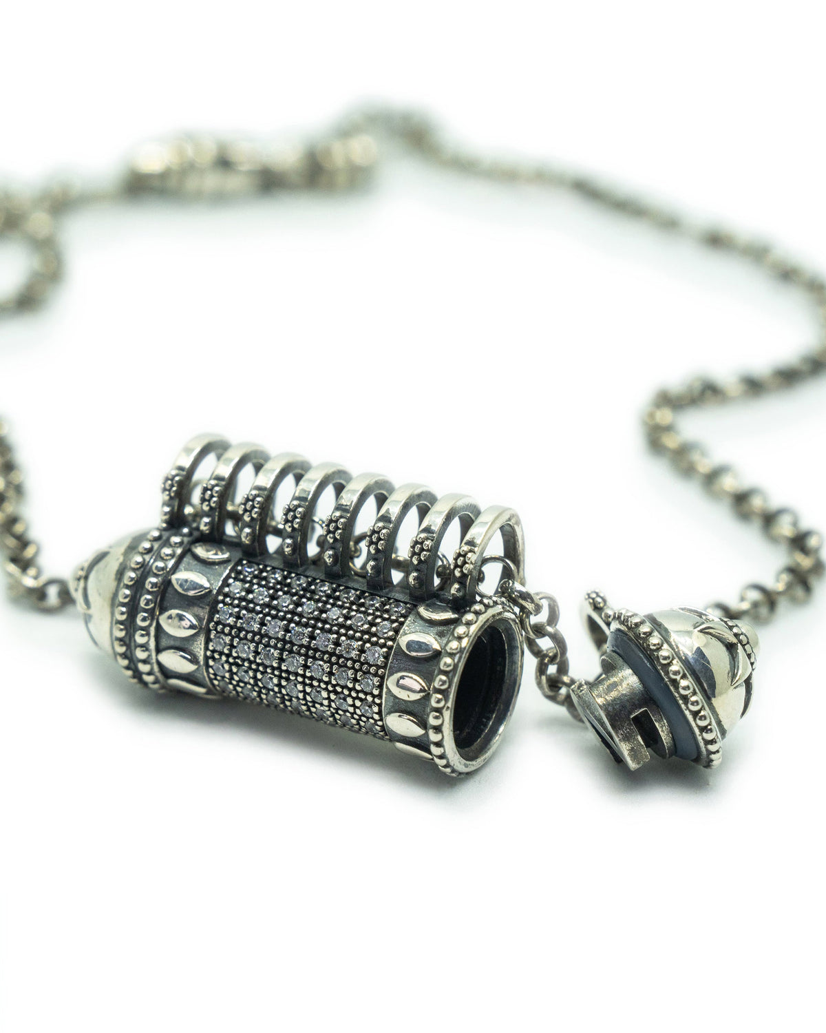 Antique Pave amulet necklace in sterling silver, shown open with the chamber visible.
