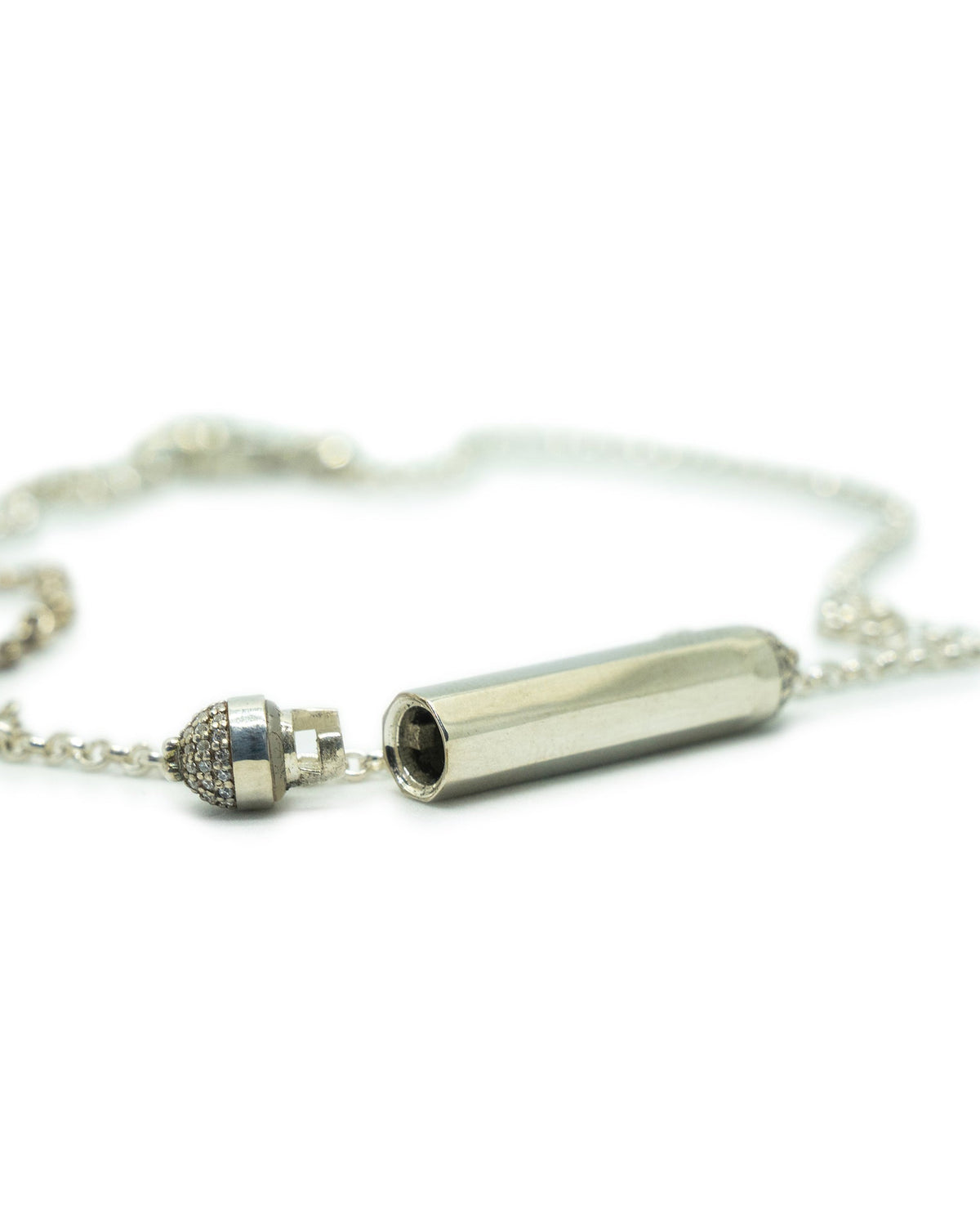 Kerala Pave amulet necklace in sterling silver, shown open with the chamber visible.