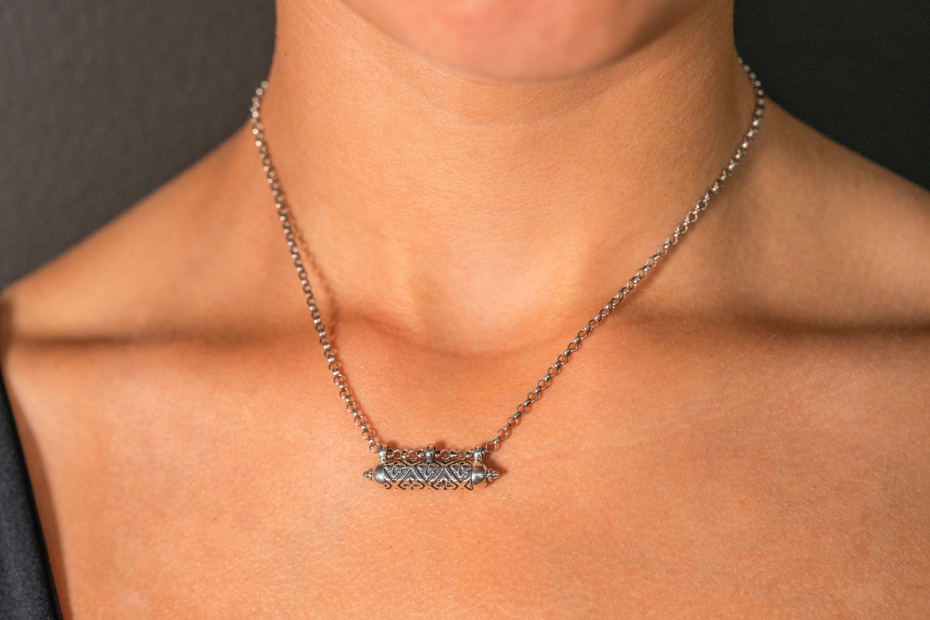 Shakti sterling silver amulet necklace worn on the body.