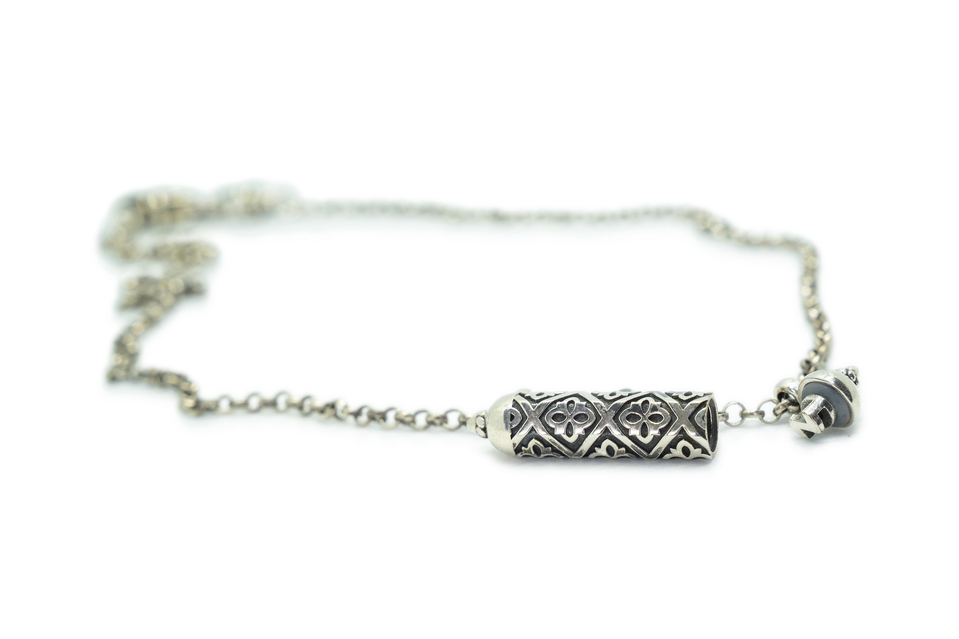 Shakti sterling silver amulet necklace shown open.
