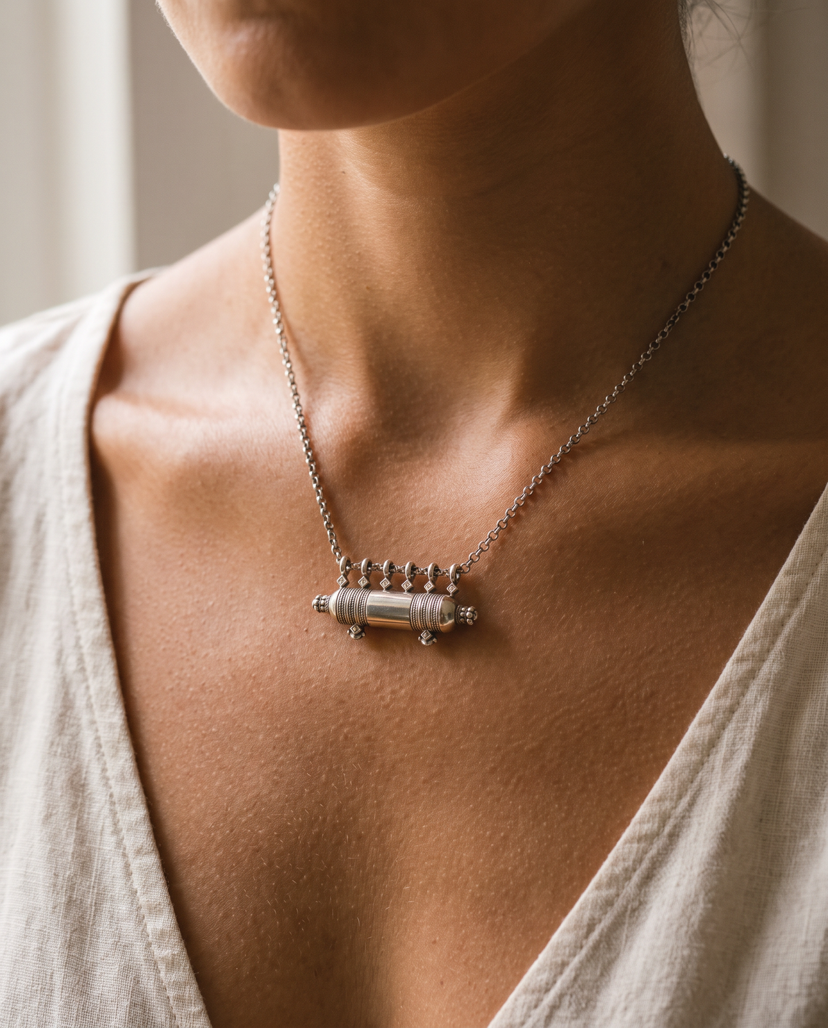 Sterling silver Yemen Wedding amulet necklace, worn.