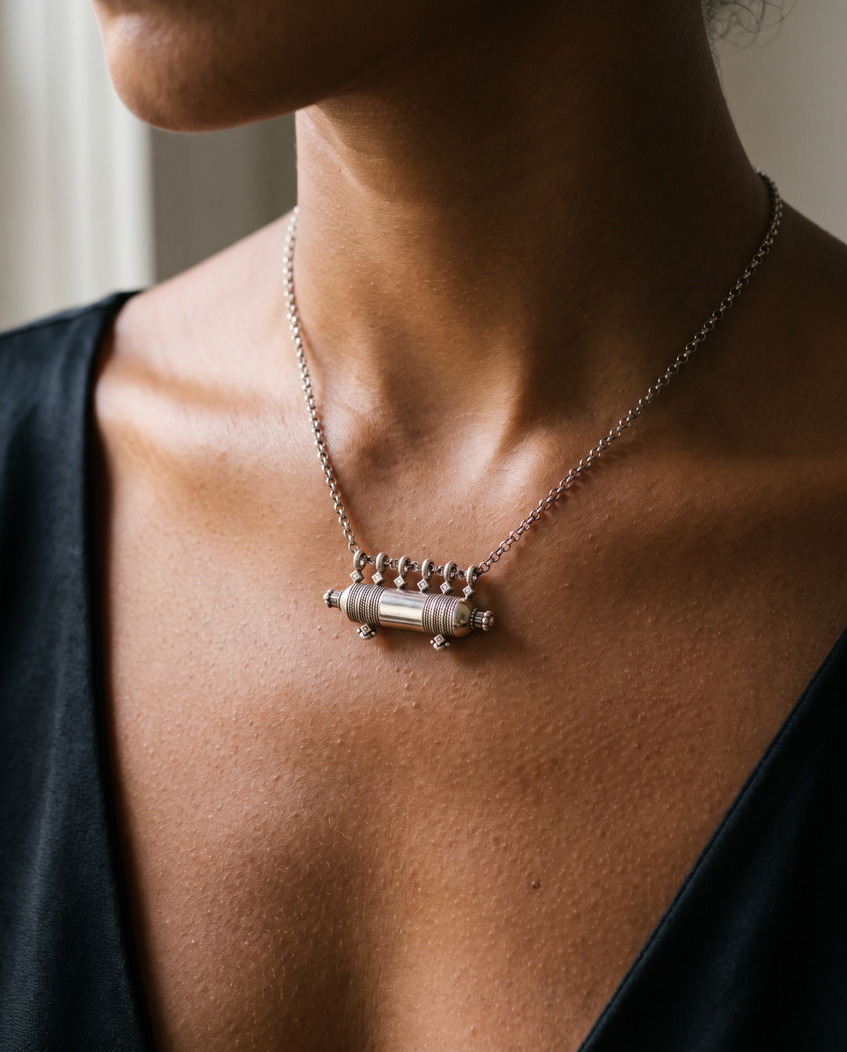 Sterling silver Yemen Wedding amulet necklace, worn, second view.